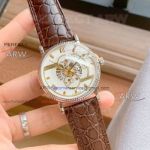 Perfect Replica Patek Philippe Gold Skeleton Dial Brown Leather Band Watch